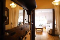 Postel nebo postele na pokoji v ubytování Precioso Ático dúplex en Canfranc, Casa Marco