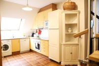 Kuchyň nebo kuchyňský kout v ubytování Precioso Ático dúplex en Canfranc, Casa Marco