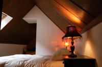 Postel nebo postele na pokoji v ubytování Precioso Ático dúplex en Canfranc, Casa Marco