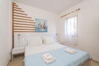 Posteľ alebo postele v izbe v ubytovaní Holiday Home Luce