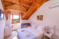 Posteľ alebo postele v izbe v ubytovaní Holiday Home Luce