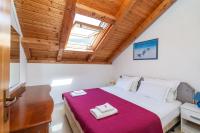 Posteľ alebo postele v izbe v ubytovaní Holiday Home Luce