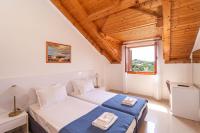 Posteľ alebo postele v izbe v ubytovaní Holiday Home Luce