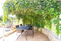 Vonkajšia záhrada v ubytovaní Holiday Home Luce