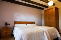 Cama o camas de una habitación en Camping & Bungalows Ligüerre de Cinca