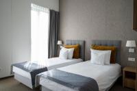 Łóżko lub łóżka w pokoju w obiekcie Hotel Arkadia Jelcz-Laskowice