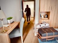 Łóżko lub łóżka w pokoju w obiekcie Hotel Arkadia Jelcz-Laskowice
