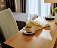 Łóżko lub łóżka w pokoju w obiekcie Hotel Arkadia Jelcz-Laskowice
