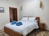Postel nebo postele na pokoji v ubytování Kemet House