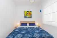 Łóżko lub łóżka w pokoju w obiekcie Apartment Presker