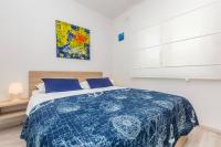 Łóżko lub łóżka w pokoju w obiekcie Apartment Presker