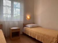 Łóżko lub łóżka w pokoju w obiekcie Apartments Nevenka P.