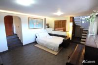 A bed or beds in a room at Villa Charma with private pool and Air conditioning close to sitges in peaceful location
