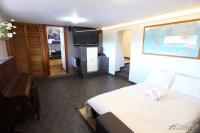 A bed or beds in a room at Villa Charma with private pool and Air conditioning close to sitges in peaceful location