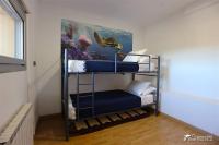 A bed or beds in a room at Villa Charma with private pool and Air conditioning close to sitges in peaceful location
