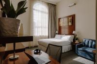 Club Quarters Hotel Rittenhouse Square, Philadelphiaにあるベッド