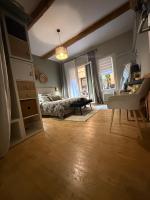 Posteľ alebo postele v izbe v ubytovaní le J&J Appartement spacieux climatisé en centre ville