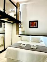 Posteľ alebo postele v izbe v ubytovaní Apartamentos Villa Serali Parking Gratis