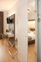 Postel nebo postele na pokoji v ubytování 23-hotel