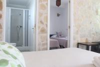 Postel nebo postele na pokoji v ubytování Hotel Casa Día y Noche