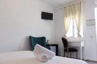 Postel nebo postele na pokoji v ubytování Hotel Casa Día y Noche