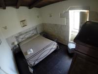 A bed or beds in a room at Antico Frantoio Penna
