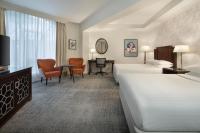 Ein Bett oder Betten in einem Zimmer der Unterkunft Delta Hotels by Marriott Worsley Park Country Club