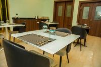 En restaurant eller et andet spisested på The Stallion Abuja