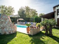 The swimming pool at or close to Holiday Home Rêve d'Or by Interhome