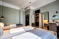 Łóżko lub łóżka w pokoju w obiekcie Vayalen Boutique Hotel