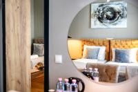 Łóżko lub łóżka w pokoju w obiekcie Vayalen Boutique Hotel