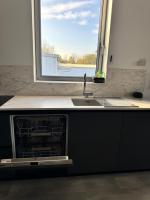 Kuchyňa alebo kuchynka v ubytovaní Loft épuré avec parking privé.