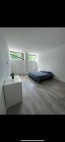 Posteľ alebo postele v izbe v ubytovaní Loft épuré avec parking privé.