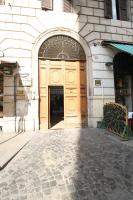 a large wooden door to a building at Rosetta in Rome