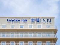 東横INN名古屋名駅南に飾ってある許可証、賞状、看板またはその他の書類