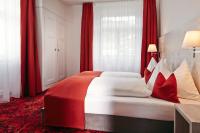 Postel nebo postele na pokoji v ubytování Hotel Restaurant Bellevue au Lac