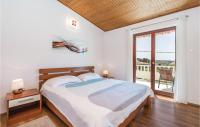 Posteľ alebo postele v izbe v ubytovaní Stunning Home In Banjol
