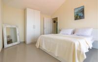 Postel nebo postele na pokoji v ubytování Holiday Home Gornji Tucepi 36