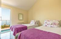 Postel nebo postele na pokoji v ubytování Holiday Home Gornji Tucepi 36