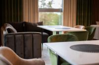 Гостиная зона в Suncity Hotel & SPA