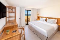 Postel nebo postele na pokoji v ubytování Playa Surf CBbC Hotel