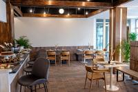 Reštaurácia alebo iné gastronomické zariadenie v ubytovaní Hotel Faranda Rias Altas, Ascend Hotel Collection