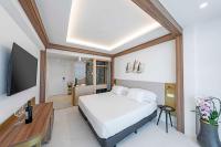 Posteľ alebo postele v izbe v ubytovaní Hotel Faranda Rias Altas, Ascend Hotel Collection