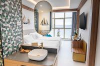 Televízia a/alebo spoločenská miestnosť v ubytovaní Hotel Faranda Rias Altas, Ascend Hotel Collection