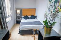 Postel nebo postele na pokoji v ubytování Hotel Faranda Pathos Gijón, Ascend Hotel Collection