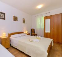 Posteľ alebo postele v izbe v ubytovaní Apartments Nada