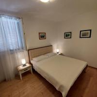 Posteľ alebo postele v izbe v ubytovaní Apartments Nada