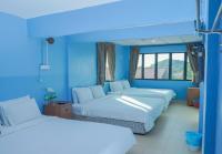 LABIS SUNRISE FARM STAYにあるベッド