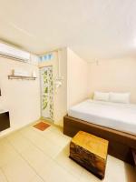 LABIS SUNRISE FARM STAYにあるベッド