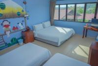 LABIS SUNRISE FARM STAYにあるベッド